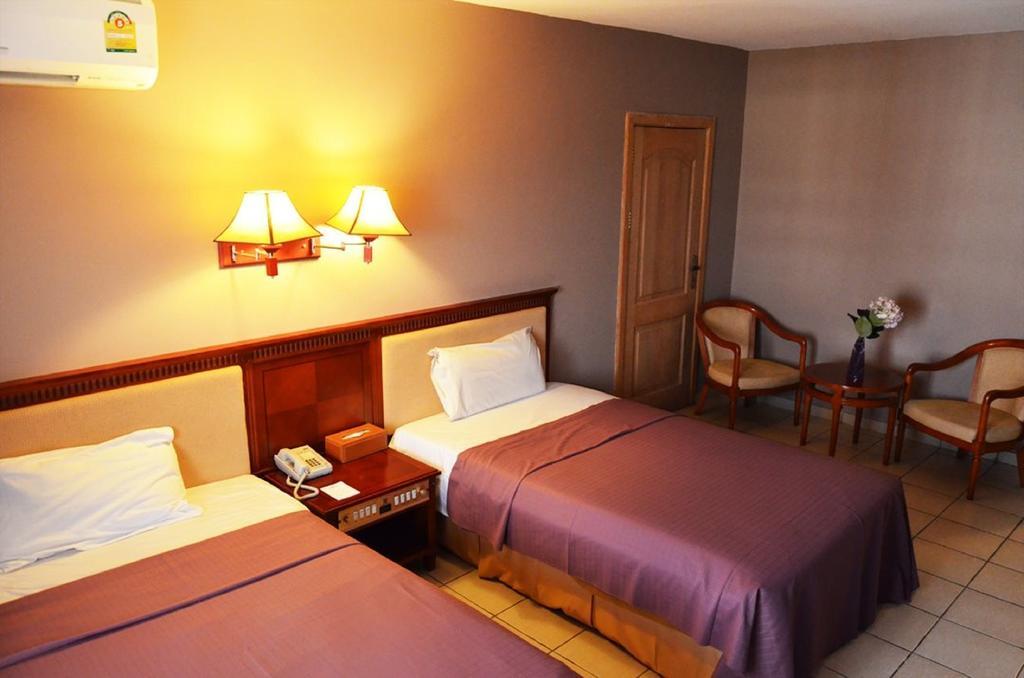 Mensvic Grand Hotel Accra Szoba fotó